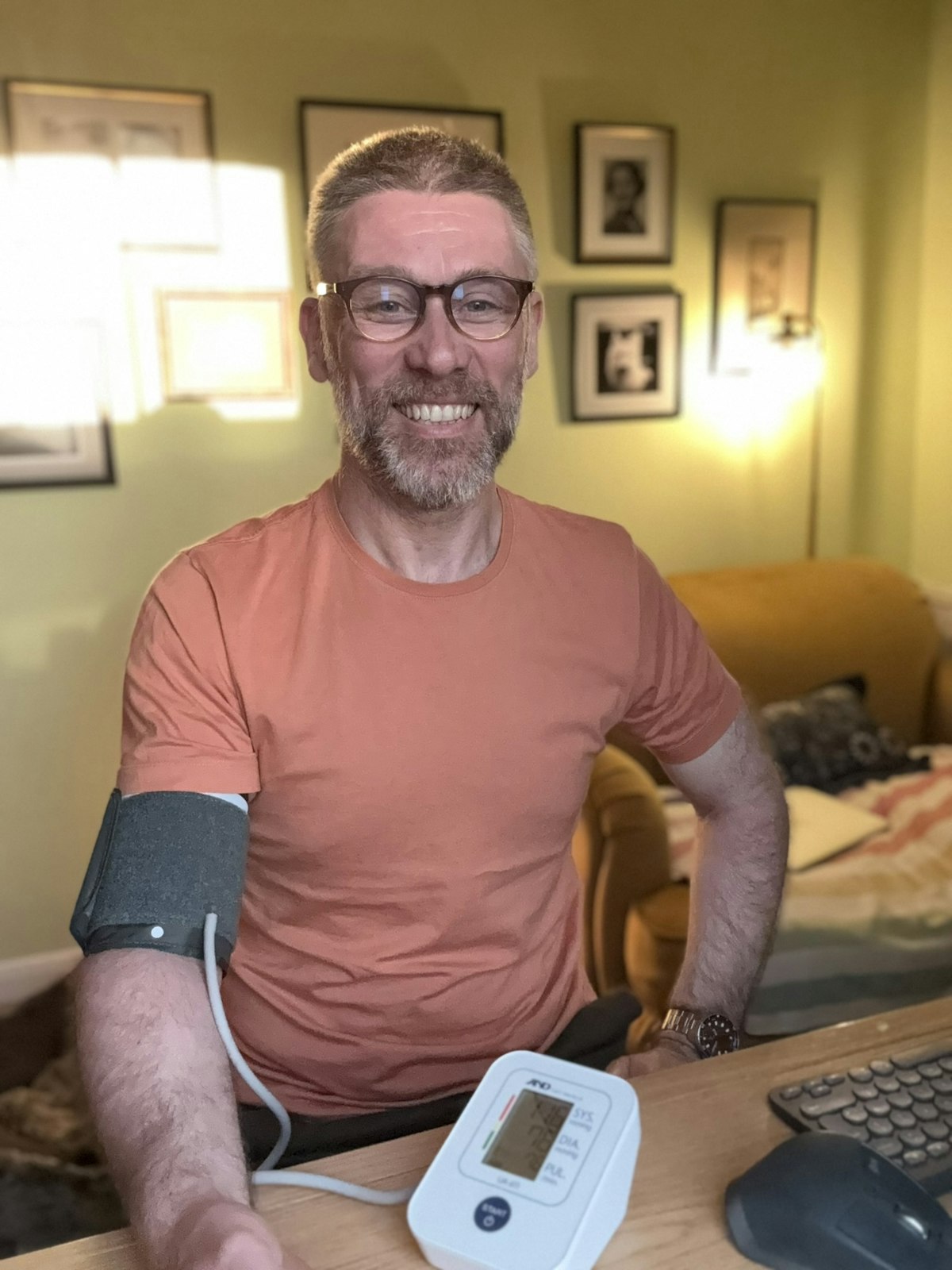 Dr Andrew Kelso checking his own blood pressure